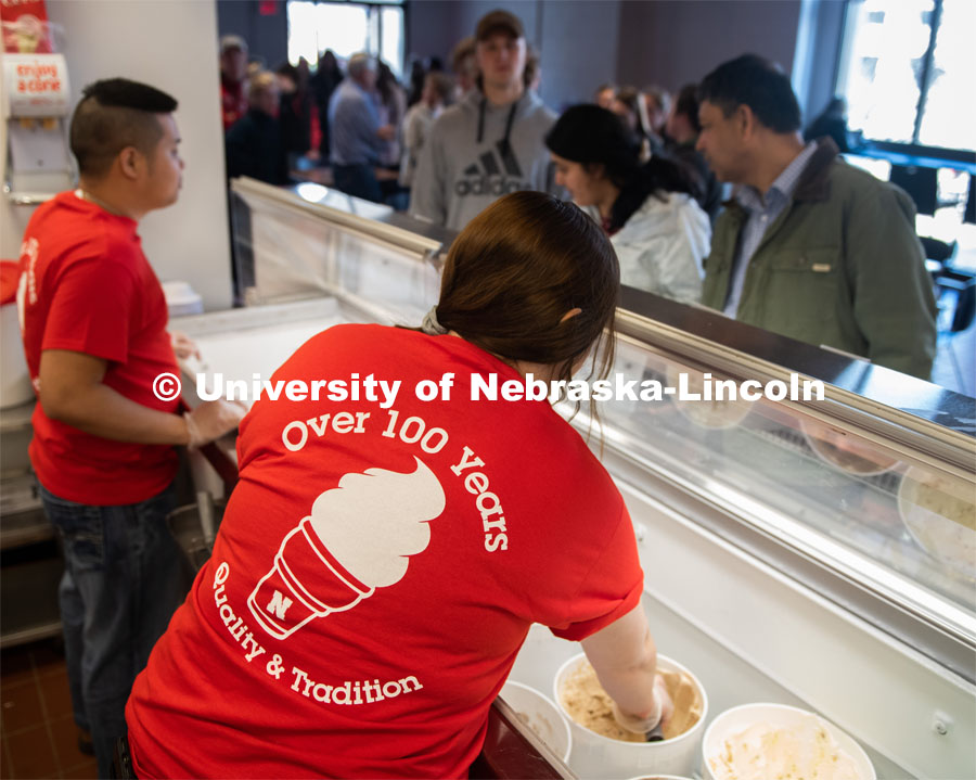 Dairy Store workers scoop ice cream for the CASNR Week Ice Cream Social, UNL Dairy Store Relocation Celebration. March 12, 2020. Photo by Gregory Nathan / University Communication.